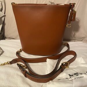 Coach Dakota Bucket Bag in Saddle